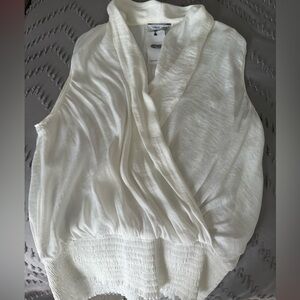 Cute sleeveless off white top